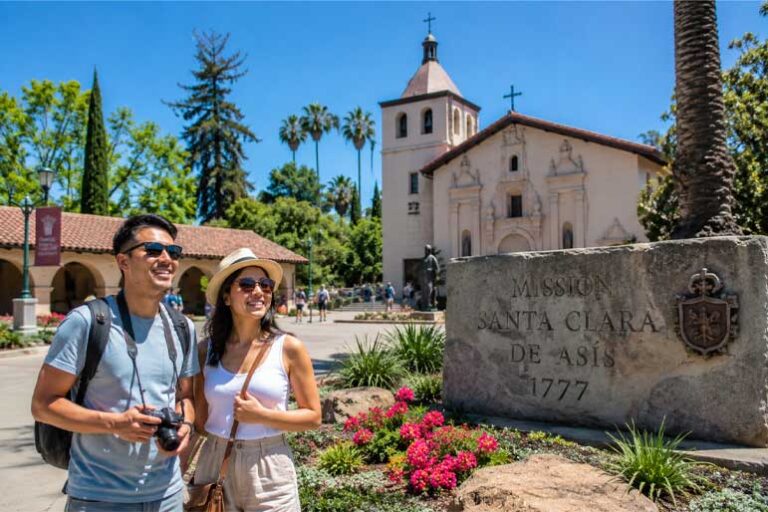 Tourists near Mission Santa Clara in California after flying BNA to SJA